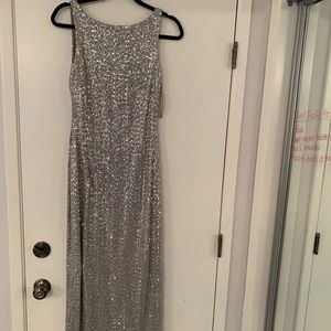 Evening gown with silver sequence and slit